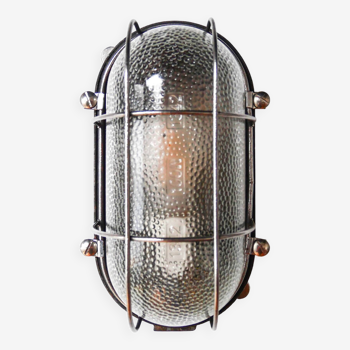 Old wall lamp in mesh hammered glass