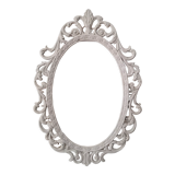 Oval frame molding patinated plant decoration