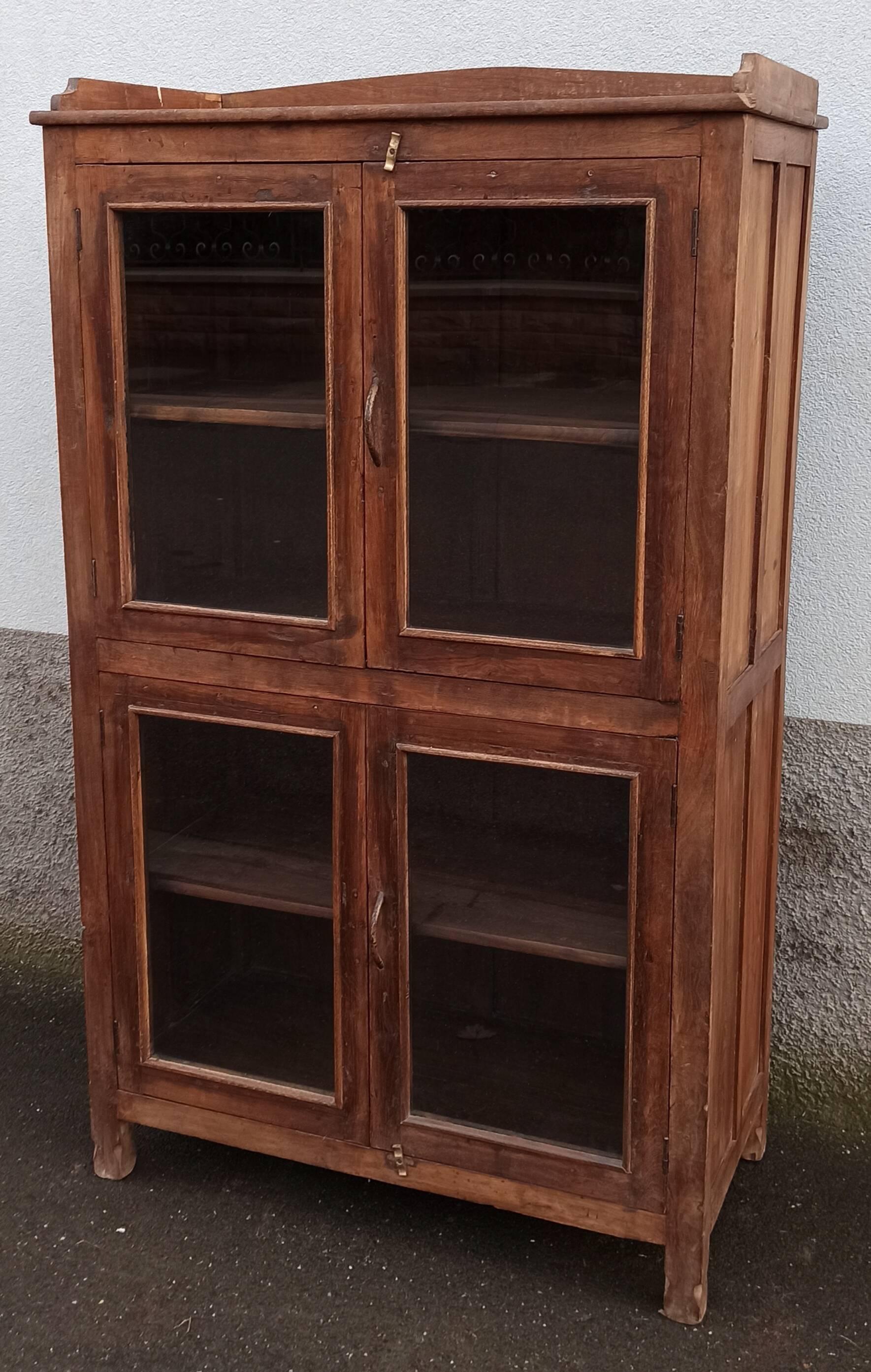 Old wooden glazed cabinet with four doors