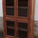 Old wooden glazed cabinet with four doors