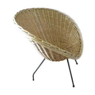 Antique round rattan armchair