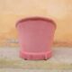 Fauteuil « crapaud » capitonné vintage vieux rose