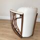 ENNIO armchair in quilted white leather with a copper stainless steel frame.