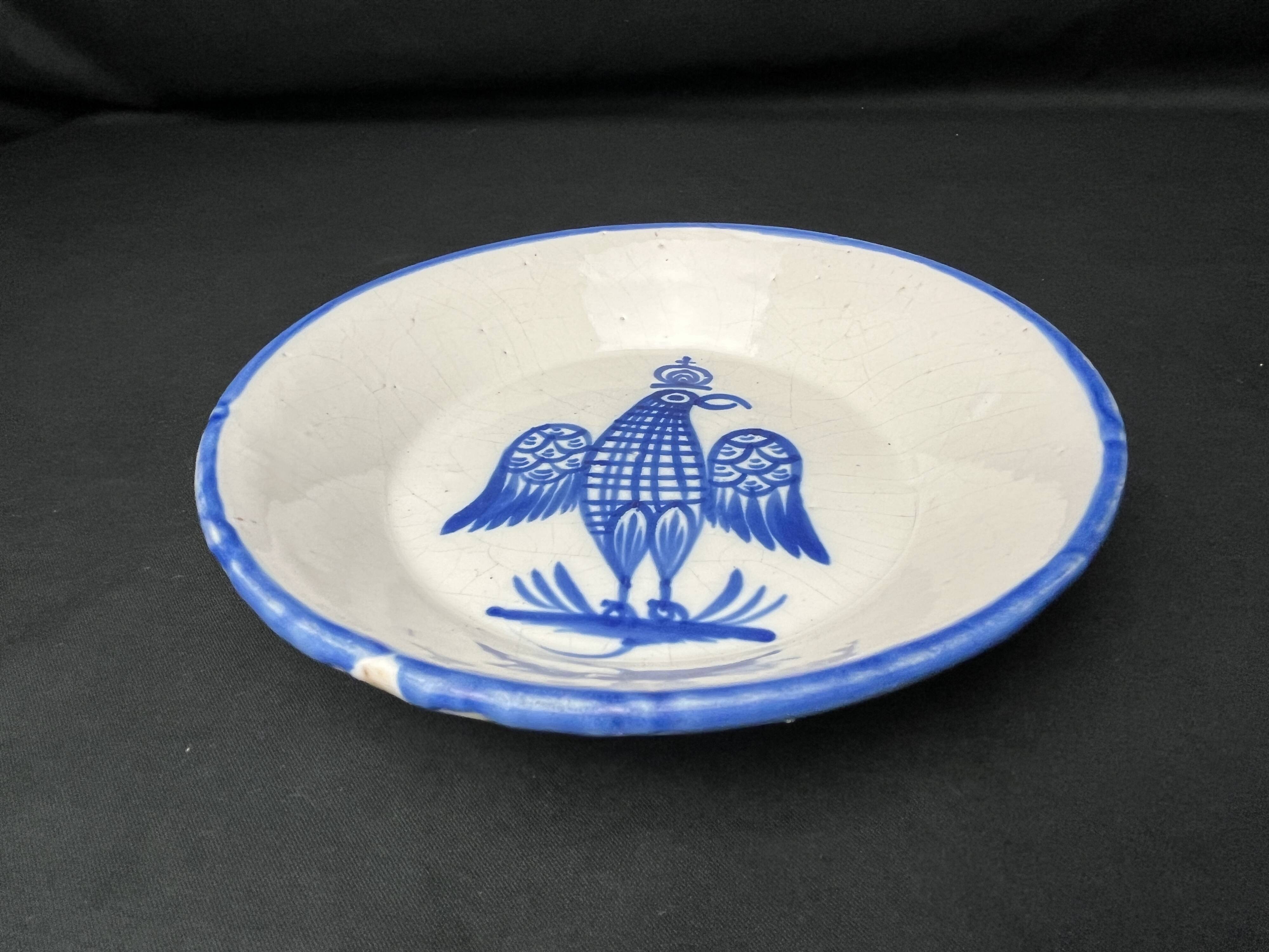 Besançon, dish decorated with a blue eagle, early 19th century