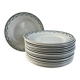 Set of 17 flat plates in Saint Amand earthenware, 22.5cm.