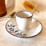 Glazed ceramic shell with painted floral decoration