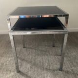 Pair of nesting tables in chromed metal and glass
