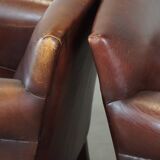 Set of 2 design armchairs made of sheepskin
