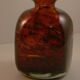 Amber-coloured vase signed Mdina