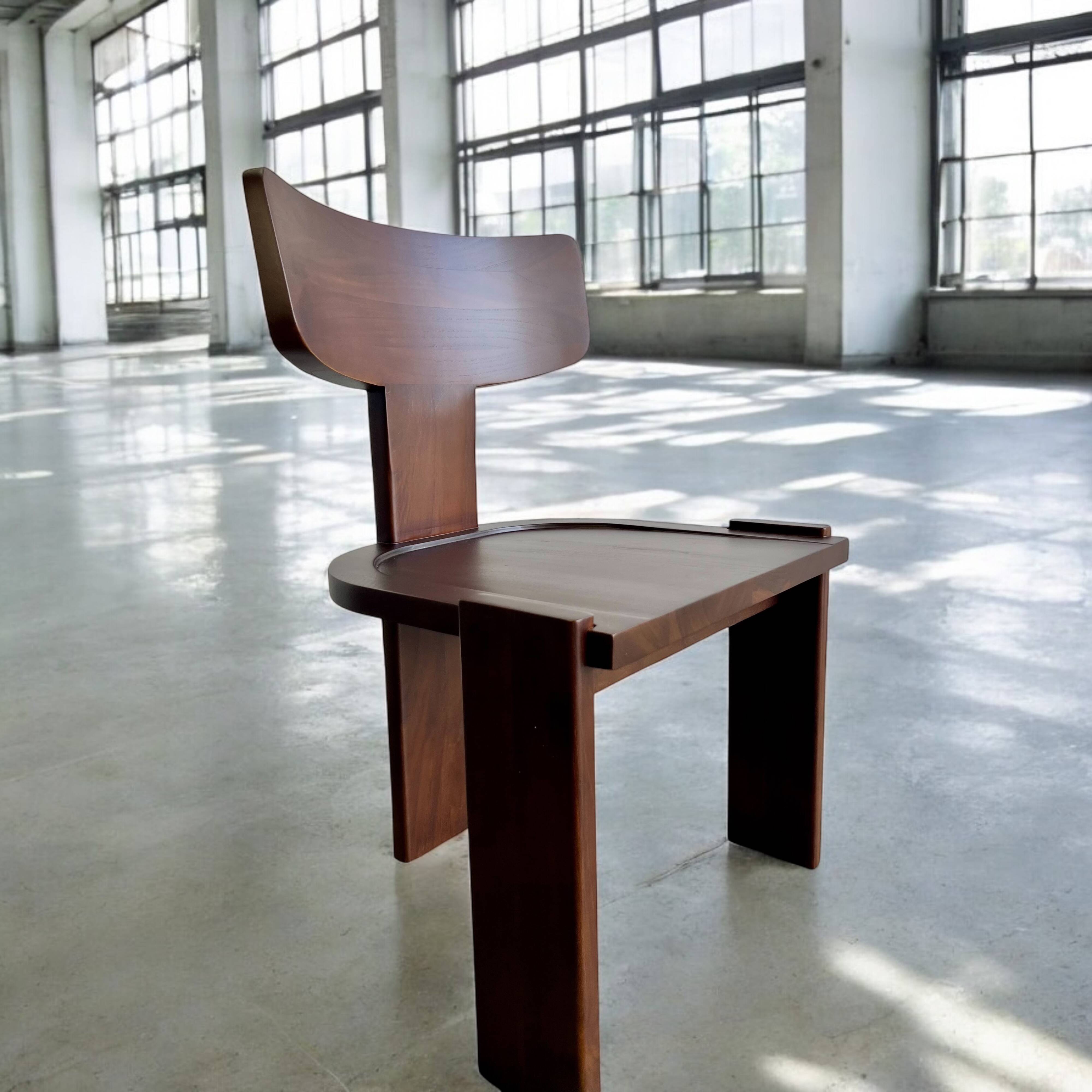 Retro brutalist chair in dark solid wood