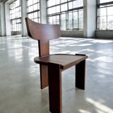 Retro brutalist chair in dark solid wood