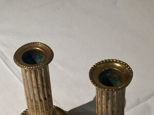 Paire de bougeoirs en bronze d’époque louis XVI