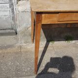 Raw wood farm table with drawer