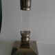 Silver-plated metal candlestick and lucite plexiglass