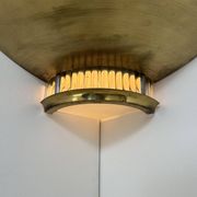 Pair of Art Deco corner sconces, brass and glass, France 1930