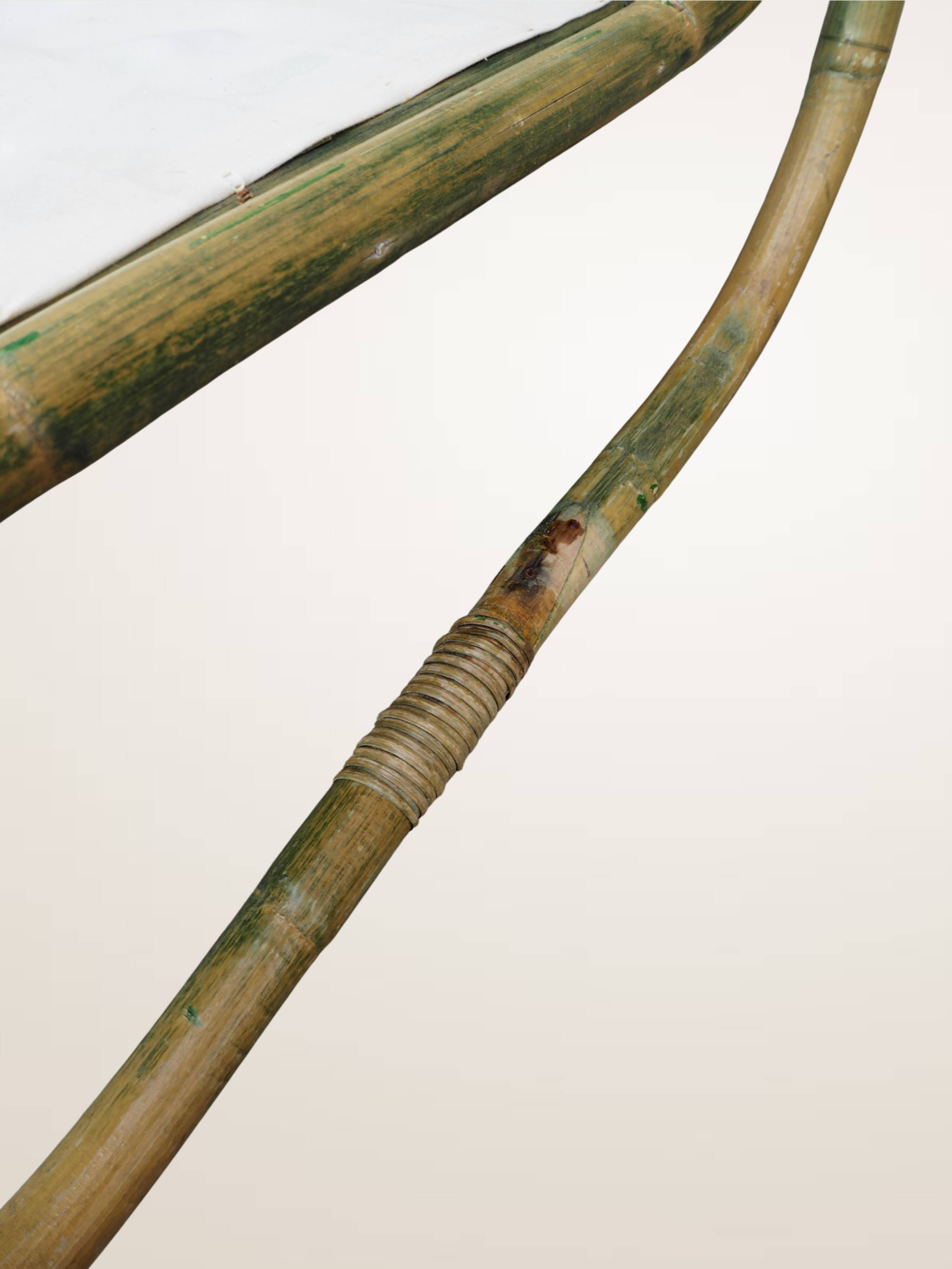 Pair of curved bamboo armchairs