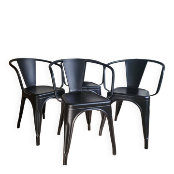Black Tolix chair with armrests