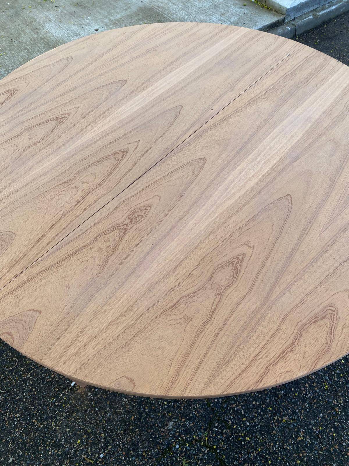 Renovated round extendable Scandinavian dining table in teak, 153cm.