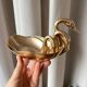 Trio of “swan” cups in gilded brass