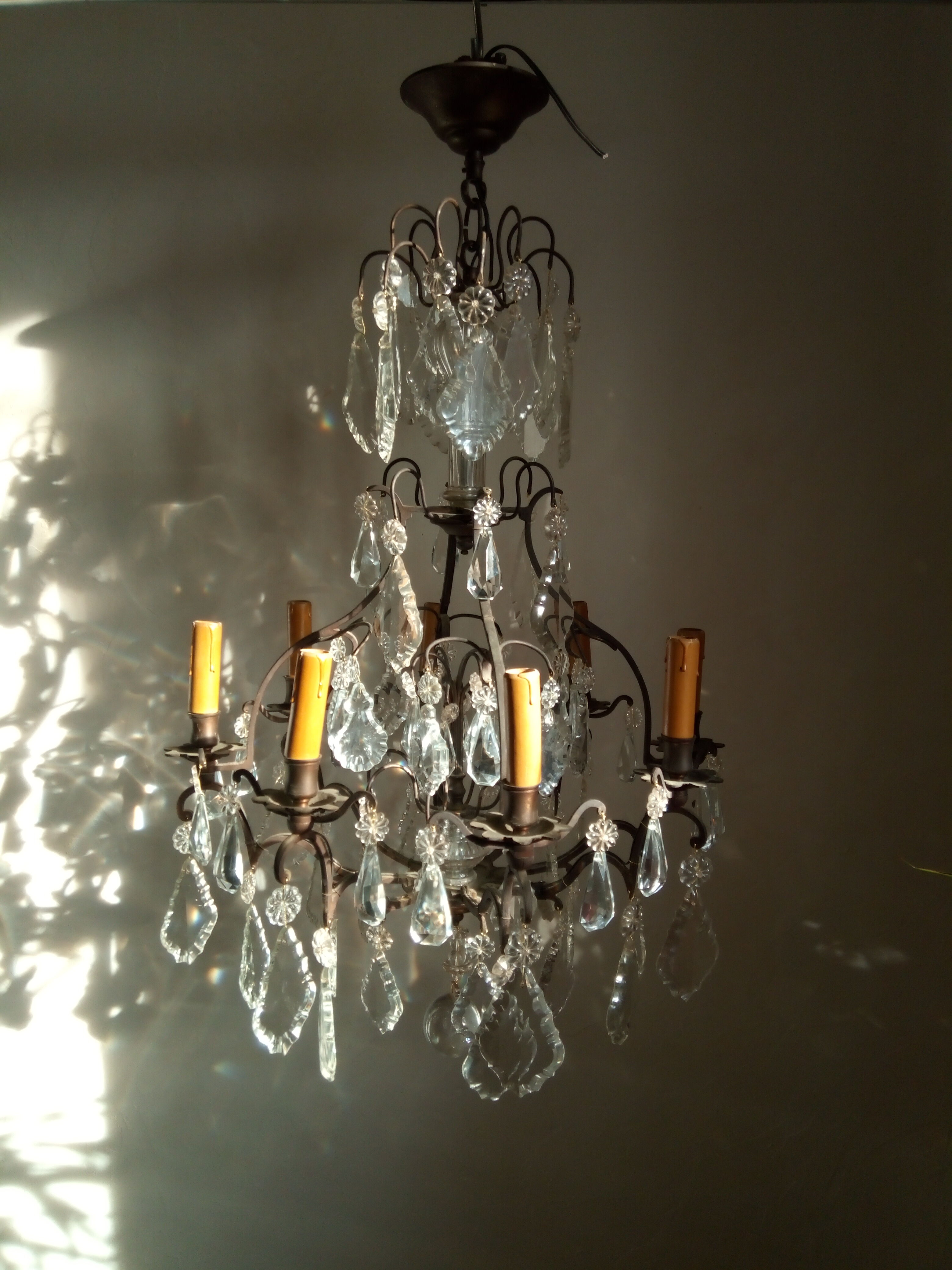 Old chandelier with tassels, bronze and crystal, 8 lights. Louis XV style.