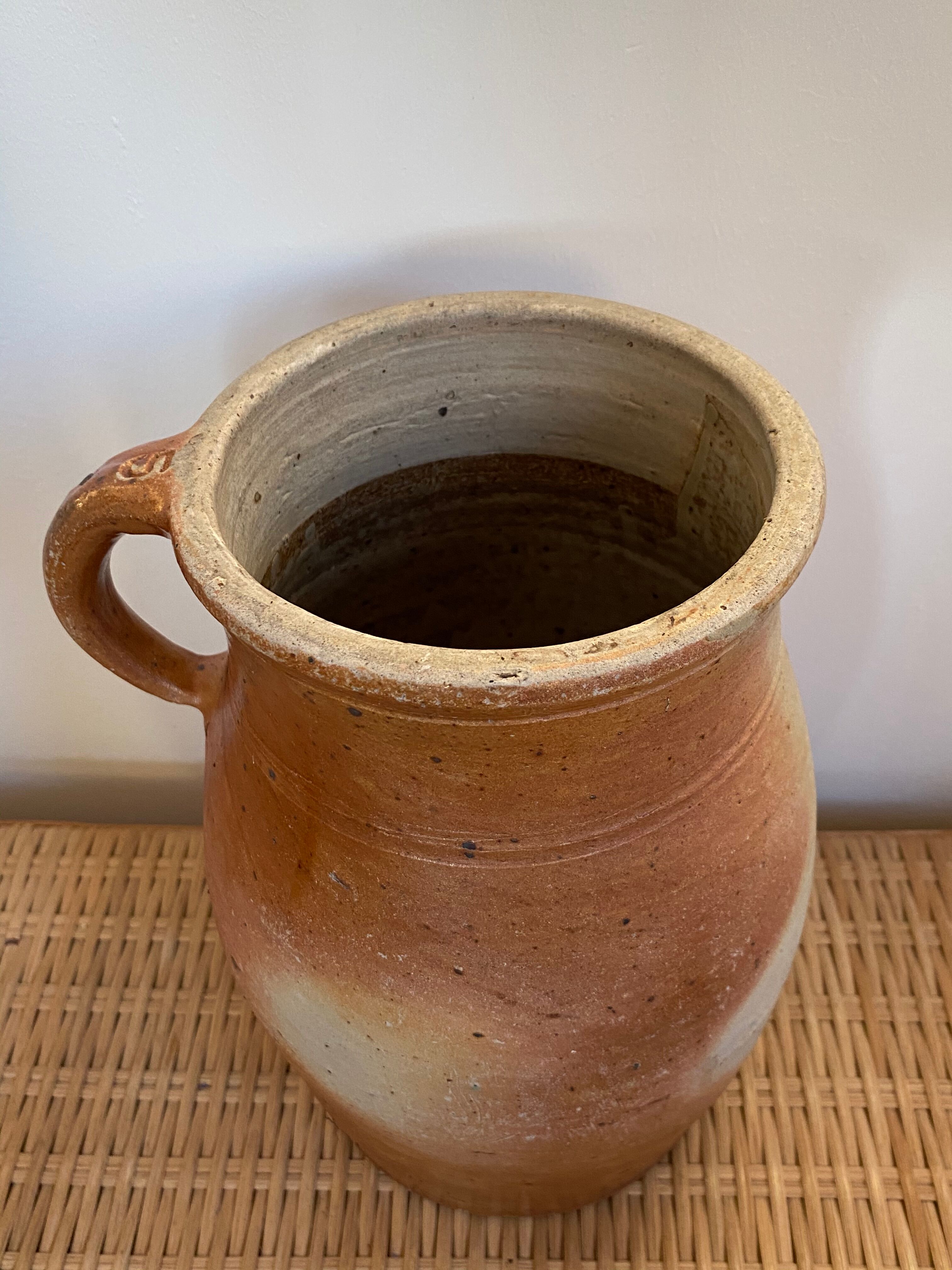Old sandstone pitcher pot