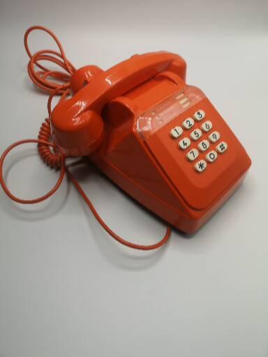Vintage bakelite orange phone
