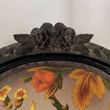 Pair of Napoleon III armchairs, in blackened wood, floral patterned fabric