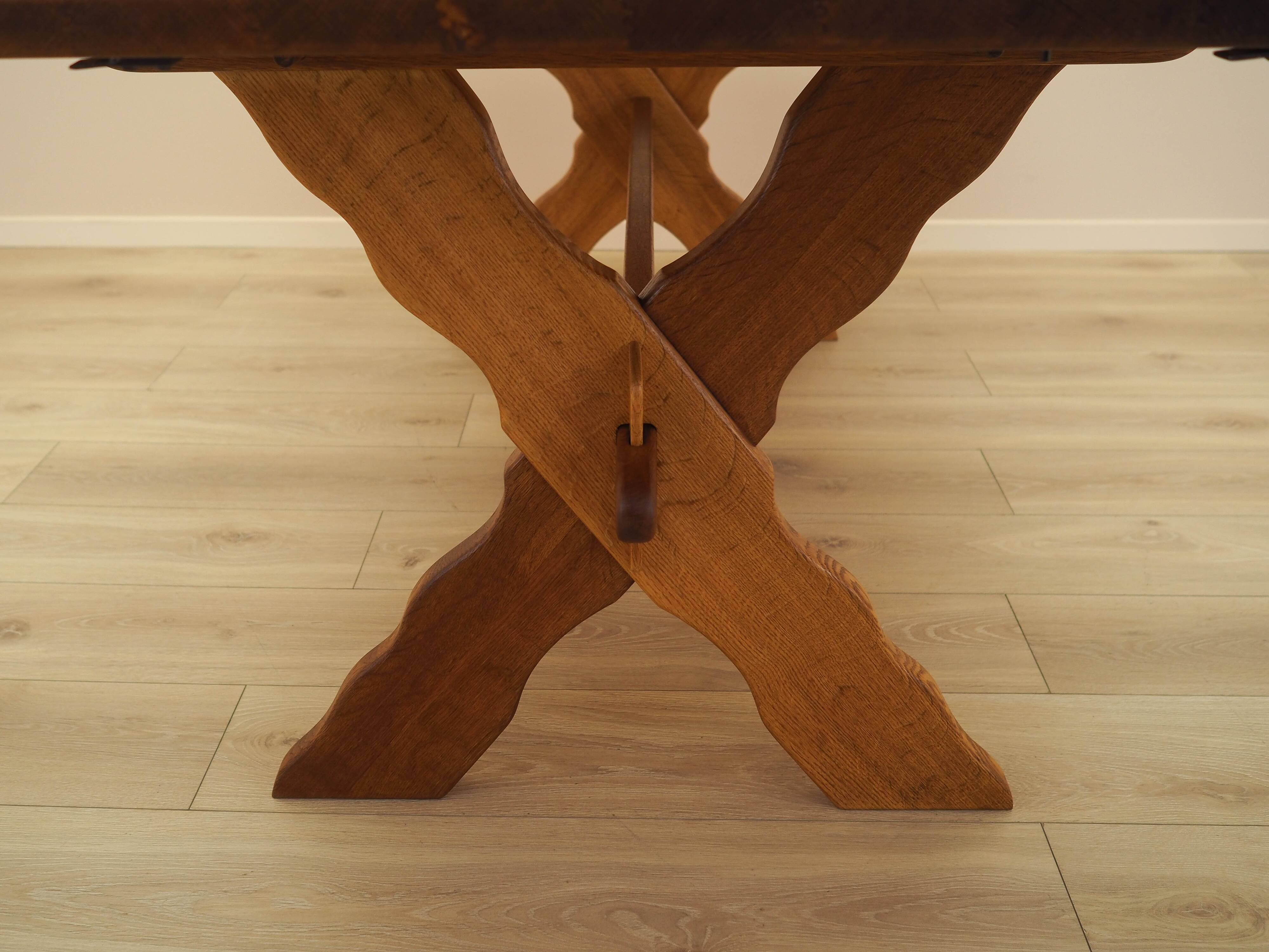 Solid oak dining table by Henning Kjærnulf, Denmark, 1960s