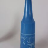 three blue bottles by Salvador Dali for Rosso Antico