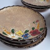 Dix assiettes à dessert de Jérôme Massier - Vallauris