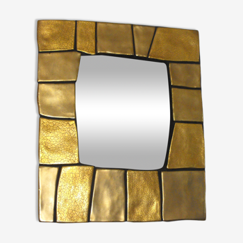 Golden mirror by Mithé Espelt from the 70s.