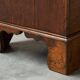 Antique English oak secretary with drop-down front.