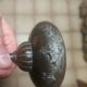Bronze bowl on marble base
