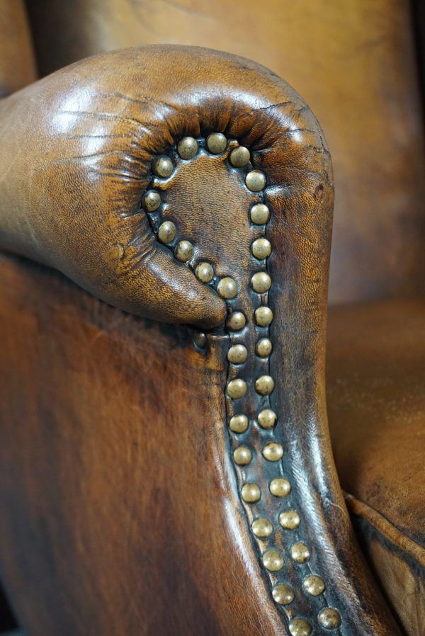 Armchair + sheepskin pouf