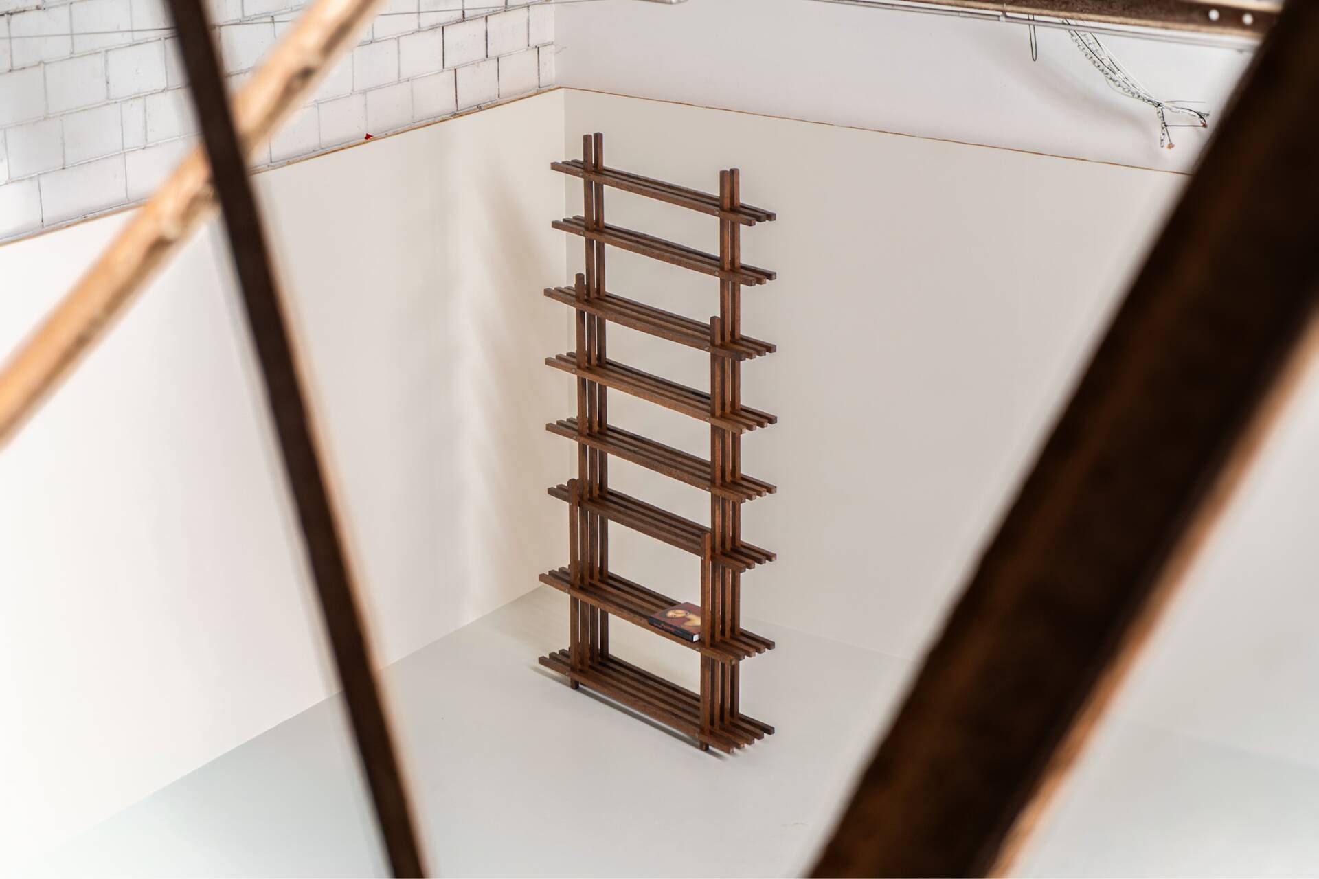Sculptural wengé slat bookcase (Europe, 1960s).
