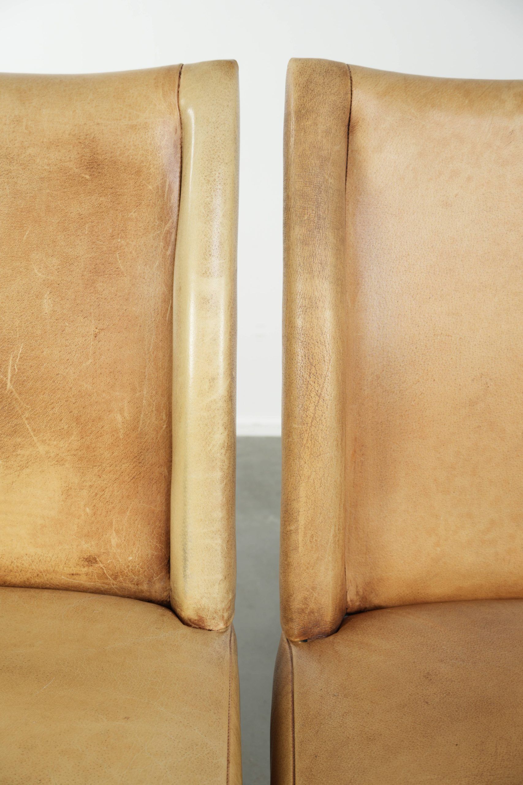 Set of six cowhide dining chairs with a comfortable seat and high back