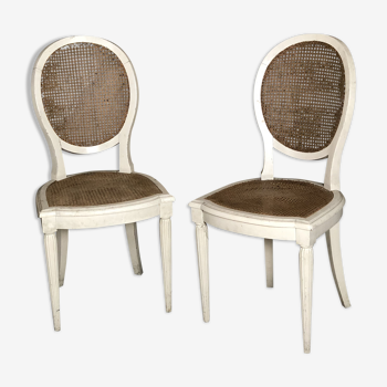 Set of 2 Louis XVI style patinated beige and cannate chairs
