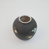 Small black ceramic vase with abstract fish and wave pattern