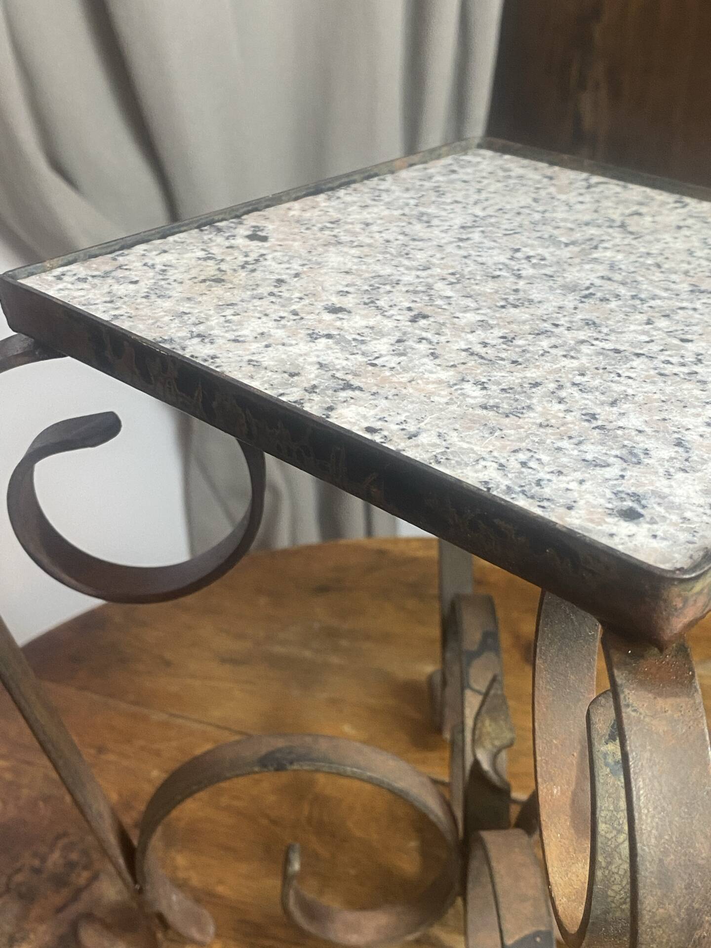 Occasional table in wrought iron and marble