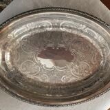 Oval plate in silver metal