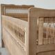 Children's bed in wood and sandblasted rattan from the 1960s.