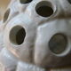 Pique flowers turtle in glazed white ceramic
