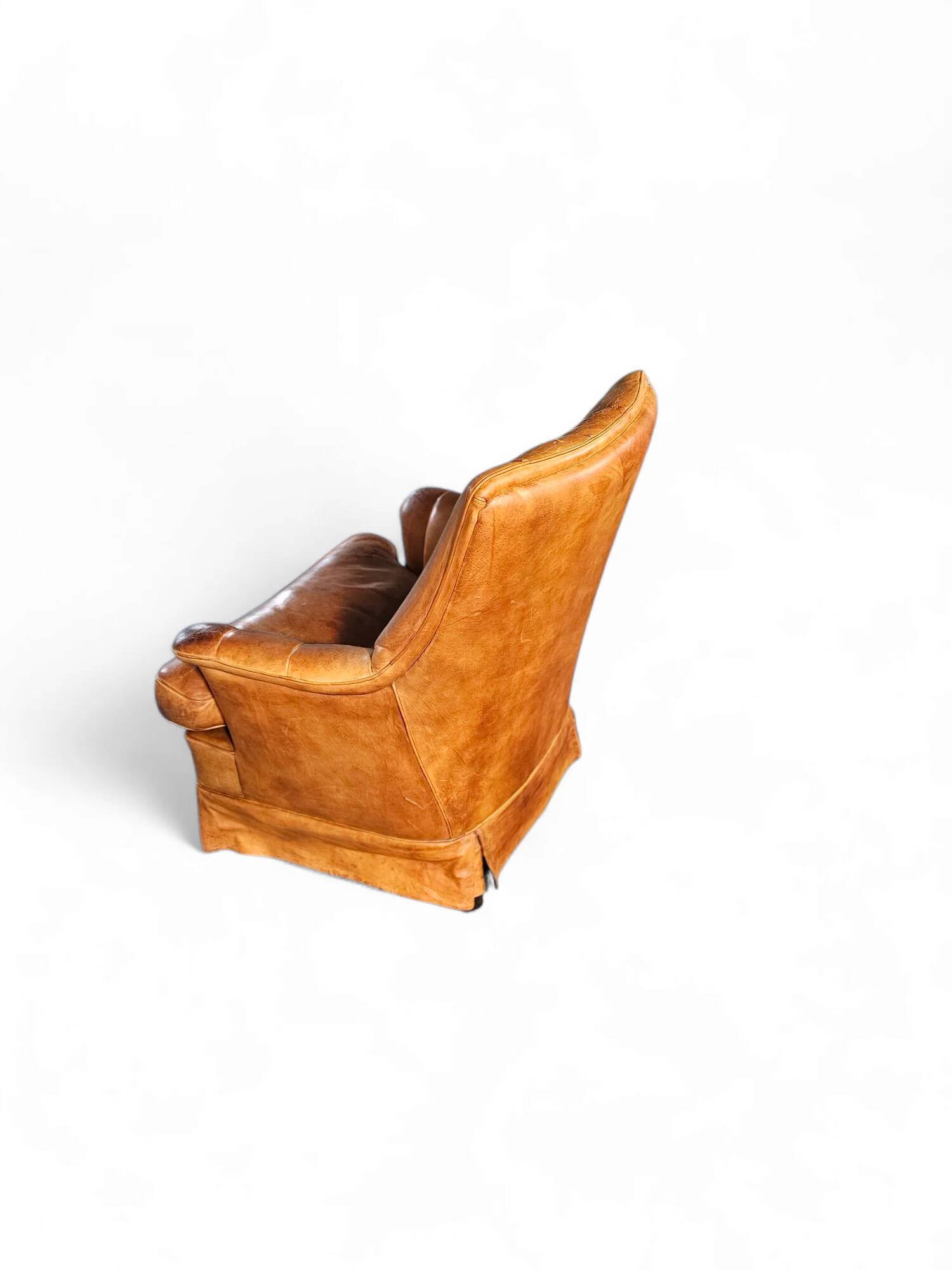 Sheep leather club chair 1970s with magazine holder
