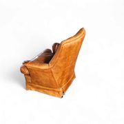 Sheep leather club chair 1970s with magazine holder