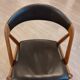 Set of 6 vintage Kai Kristiansen chairs in solid teak and black faux leather.