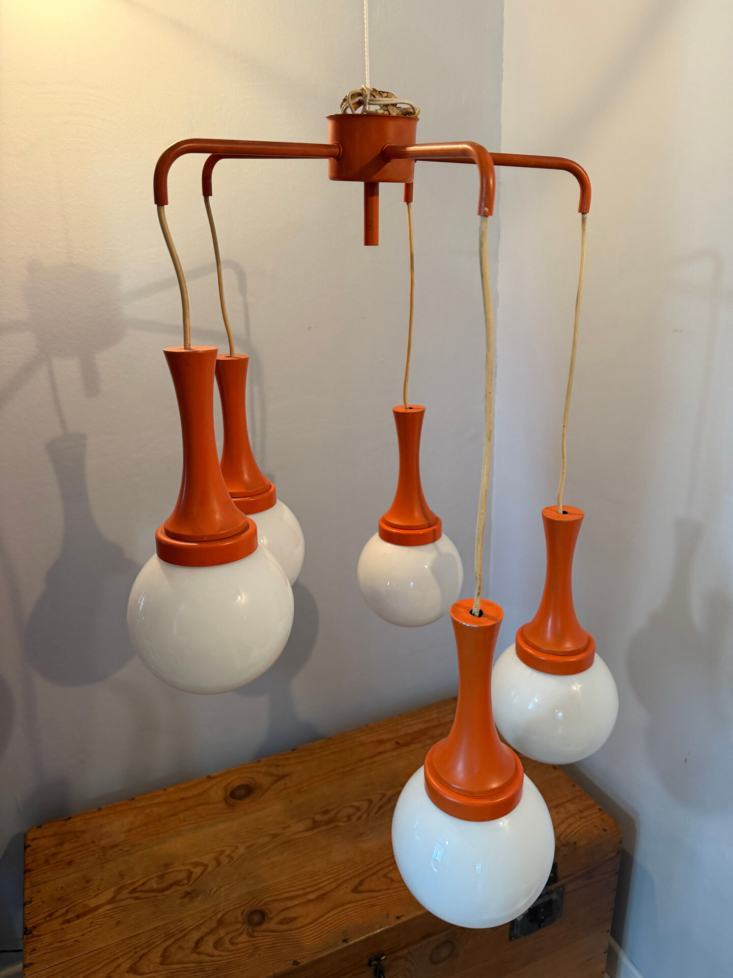 Suspension cascade design Space age orange vintage from the 70s.