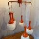 Suspension cascade design Space age orange vintage from the 70s.