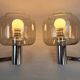 Chrome-plated metal and glass wall lights, 1970