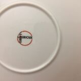 Plat de service rond “ lourioux foëcy “avec motifs de fleurs.