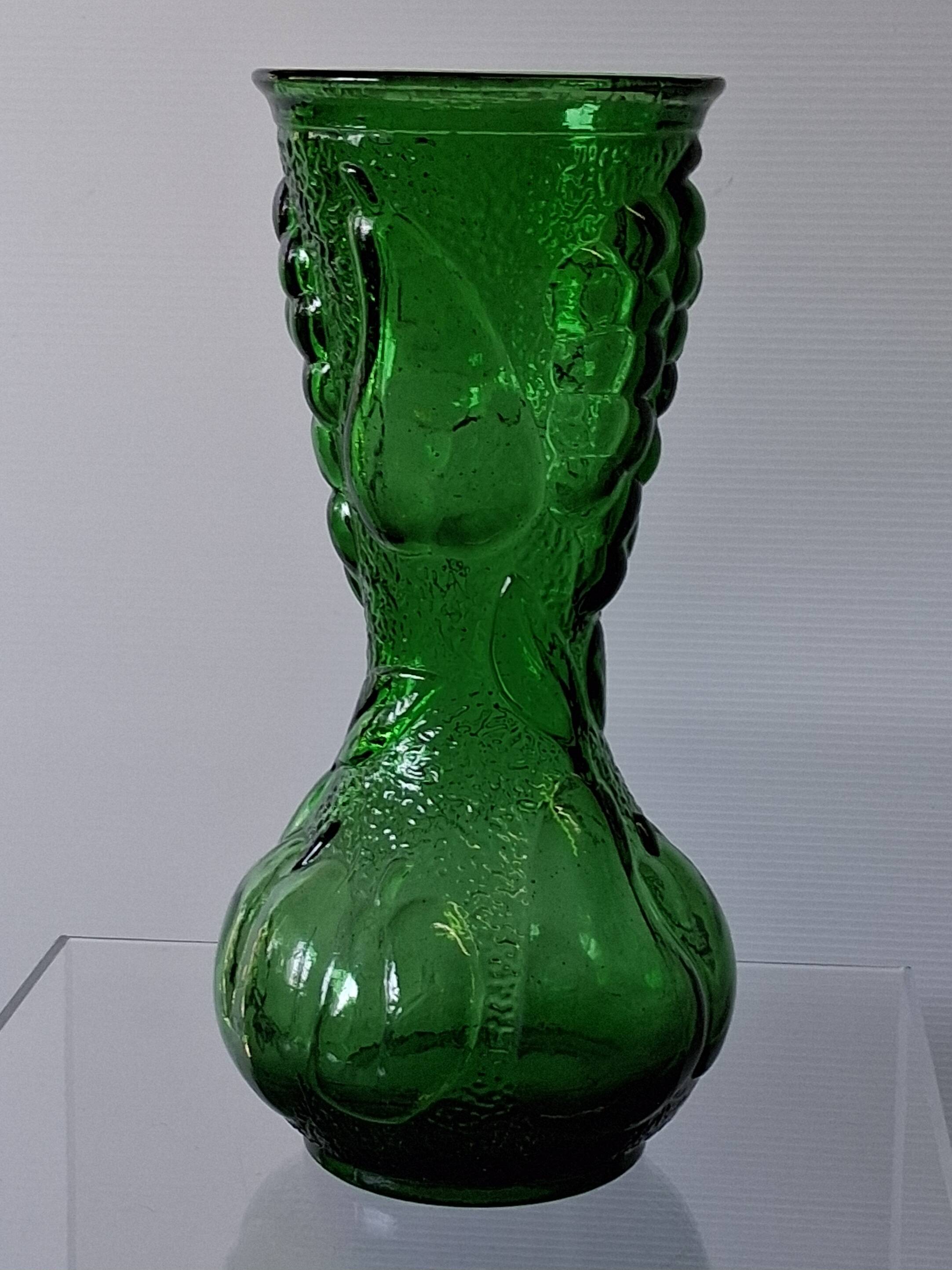 Vintage green glass vase with a fruit design in very good condition.